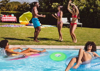 Pool party enjoying the LED Floating speaker